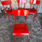 Set of 4 red metal chairs