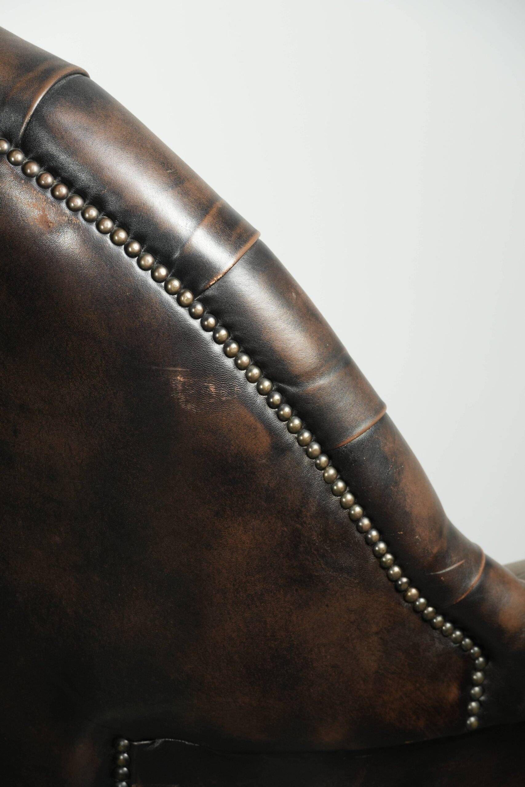 Vintage Chesterfield office chair with decorative nails in English style