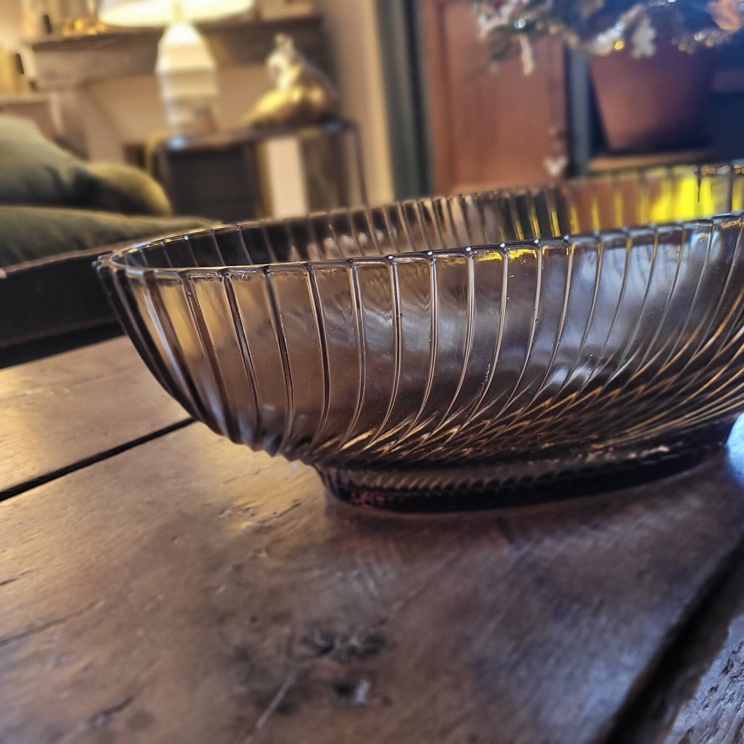 Smoked glass bowl with a radiating embossed pattern — 1970s