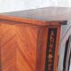 Louis XVI glass-fronted library in rosewood and amaranth veneer.