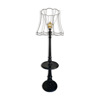 Matte black lamppost with small tablet