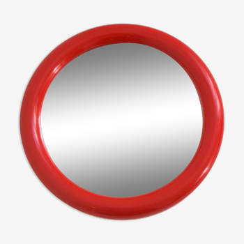 Red round mirror