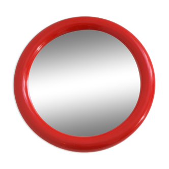 Red round mirror
