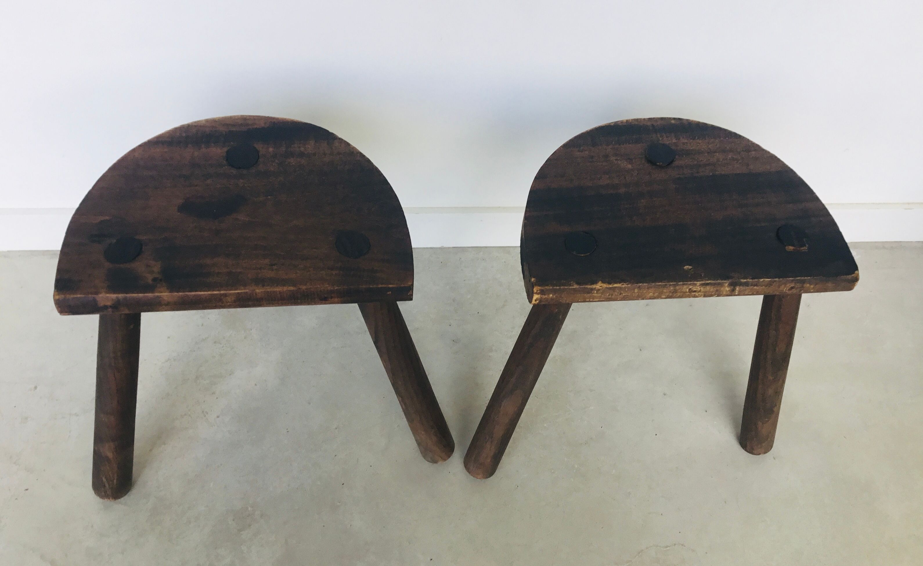 Pair of vintage tripod farm stools
