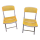 Yellow plastic and steel folding chairs, 1970s