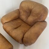 Pair of brown leather armchairs