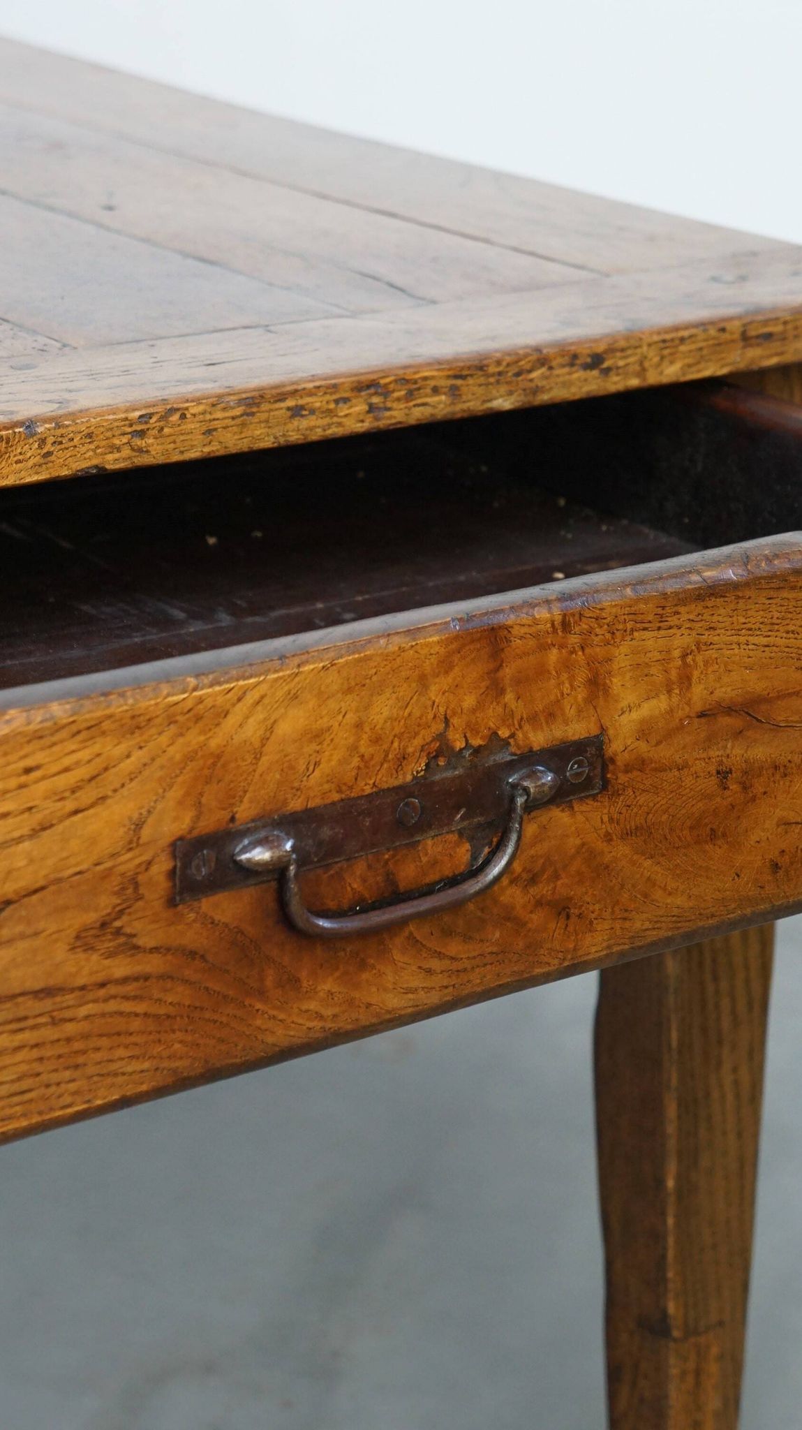 antique French oak dining table with 3 drawers and an exquisite patina