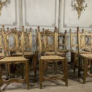 Set of 12 carved wooden chairs, Italy