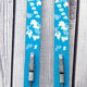 Old pair of children's ski's in light blue wood 118 cm