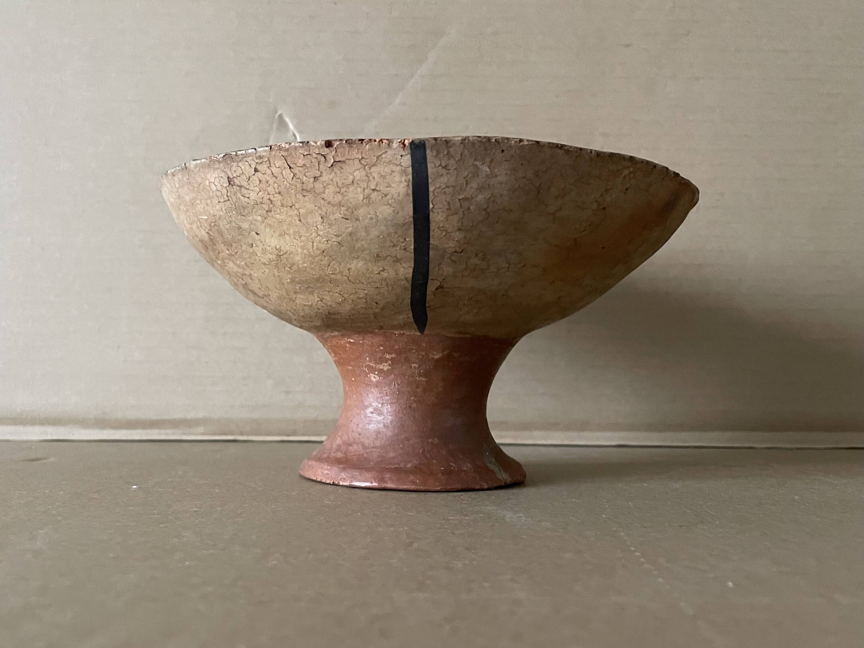 Antique terracotta cup
