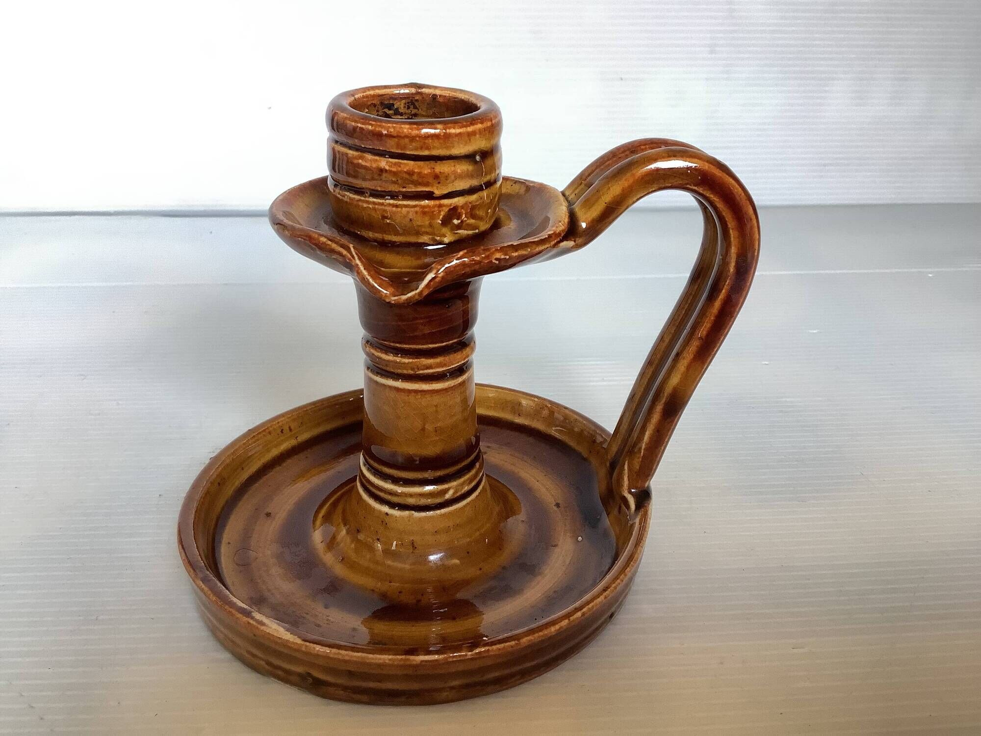 Ochre brown ceramic candle holder