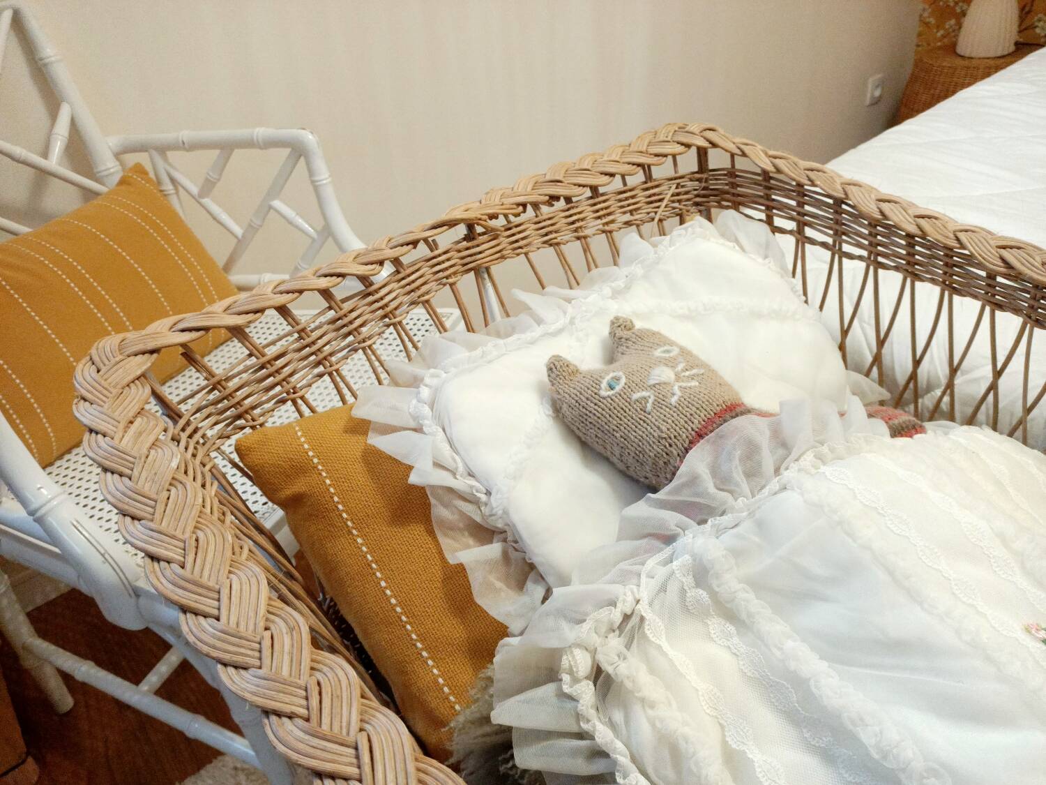 Rattan and wrought iron cradle