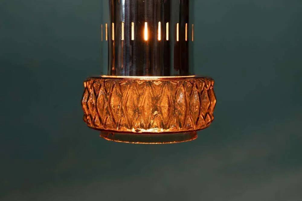 Suspended glass from the space age, mid-century glass from the 1960s.