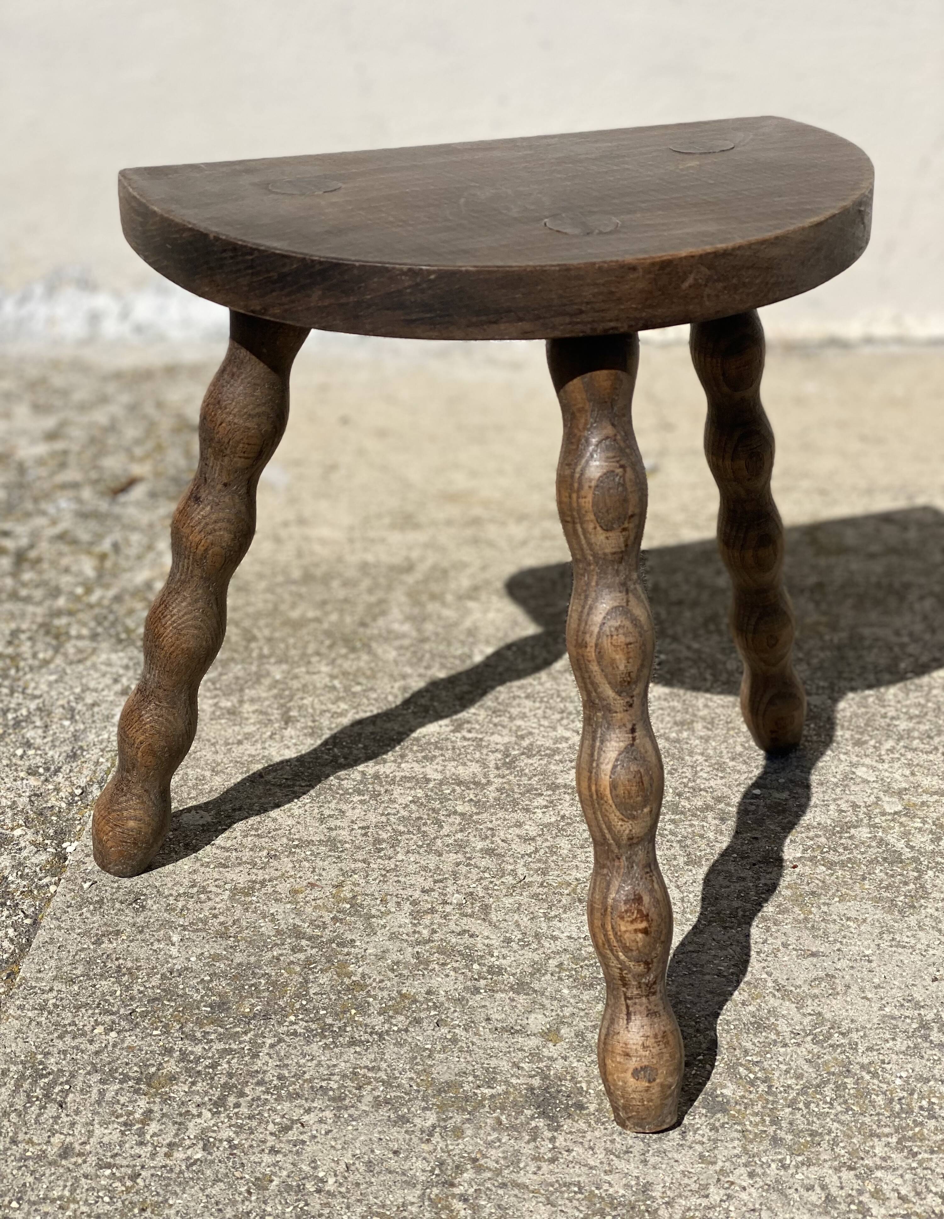 Vintage 1950s half-moon tripod stool