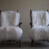 Pair of Scandinavian armchairs in oak and long-haired Icelandic sheepskin by Henning Kjærnulf, 1950.