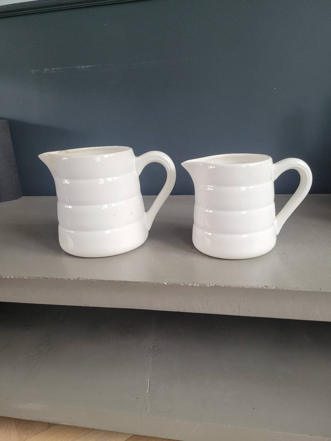 Pair of antique Gien porcelain pitchers