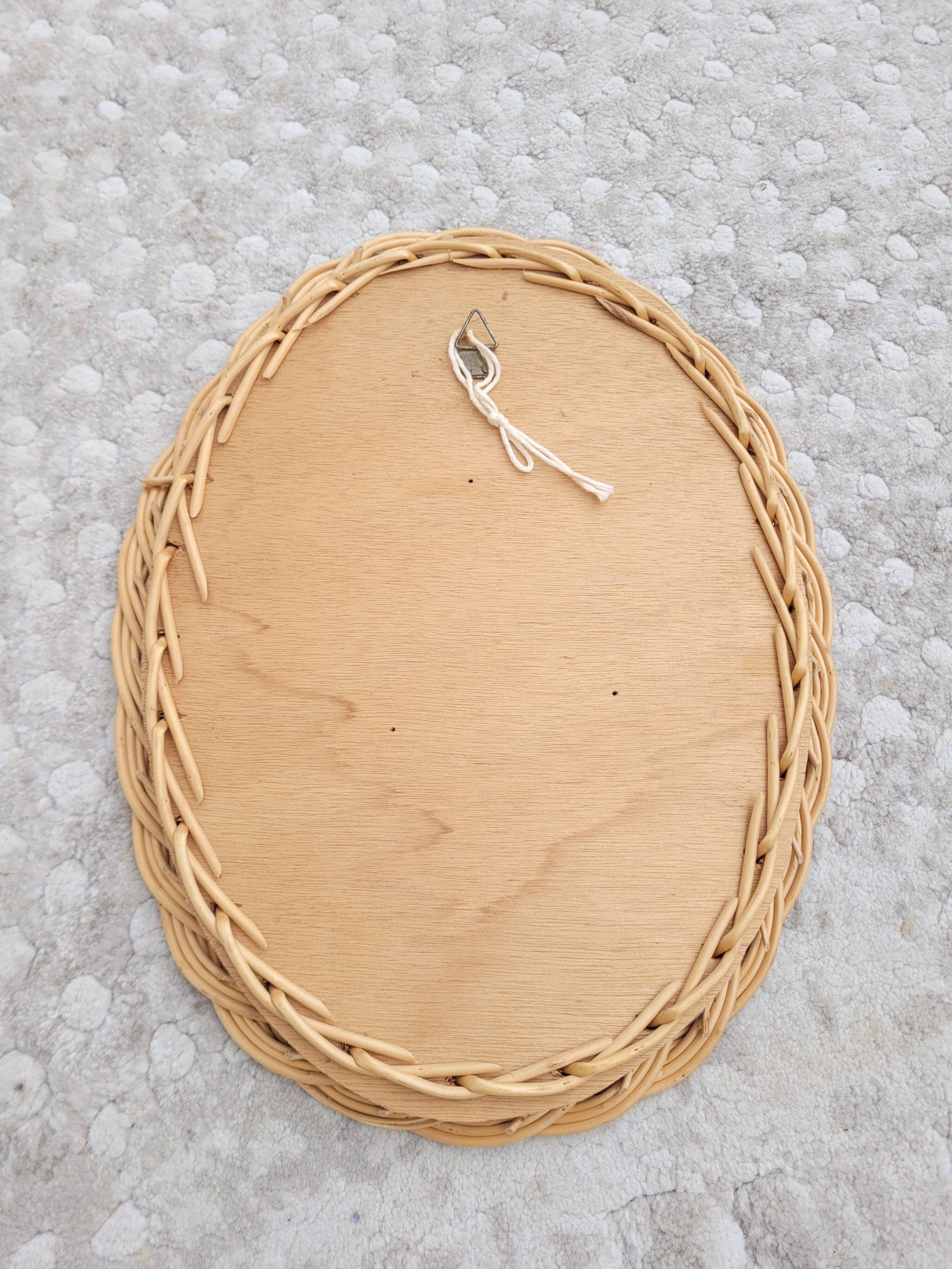 Small oval woven wicker mirror 23x30cm
