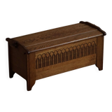 Modern Danish oak commode with decorative relief sculpture, mid-20th century.