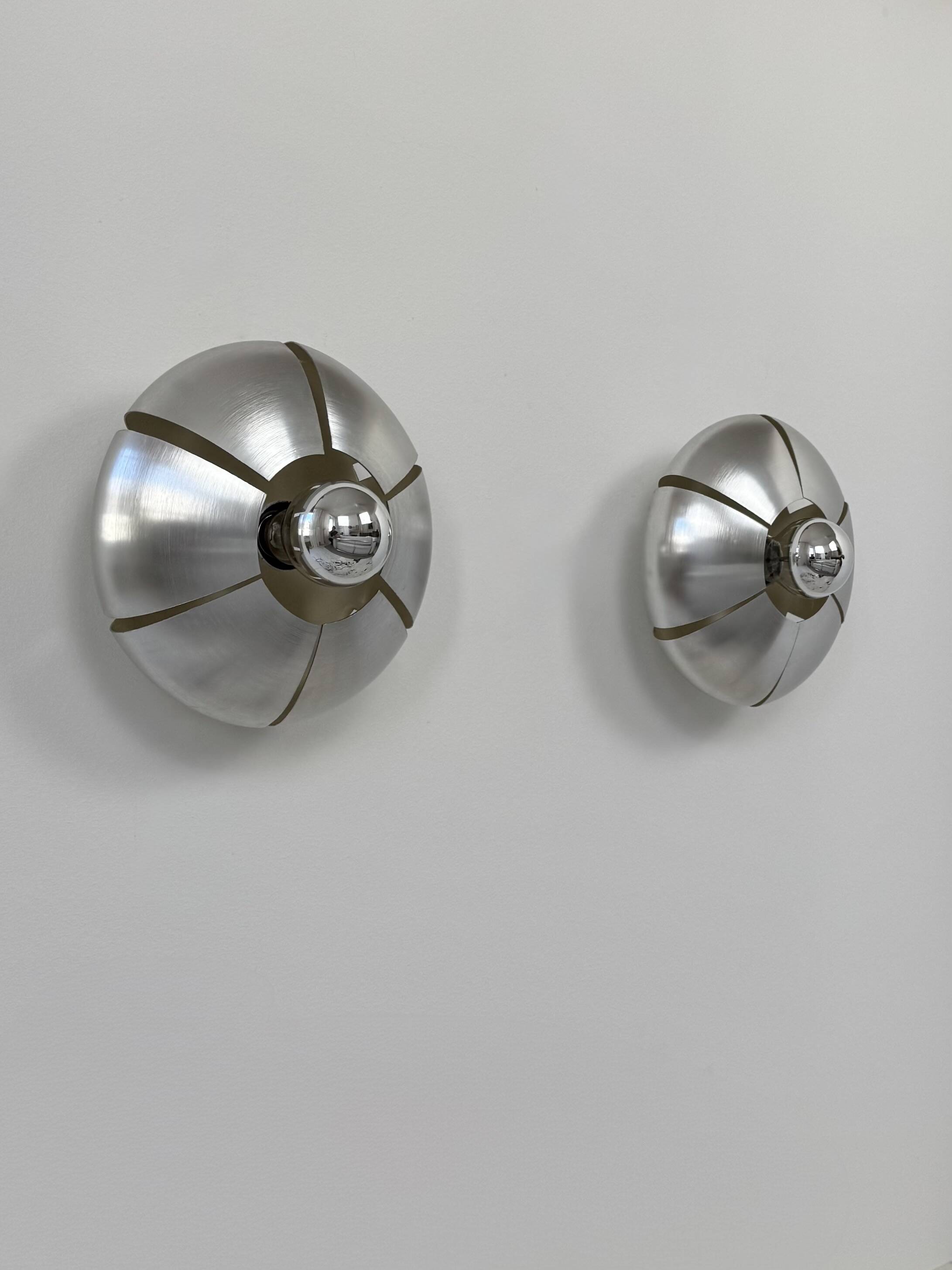 Pair of vintage wall lights, brushed aluminium, France, 1970.