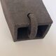 Graphical black stoneware ceramic wall light with handmade ring.
