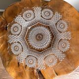 Vintage pressed glass plate with rosette design, octagonal rim, star pattern reminiscent of mandala