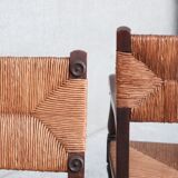 Pair of mid-century oak and rush french armchairs