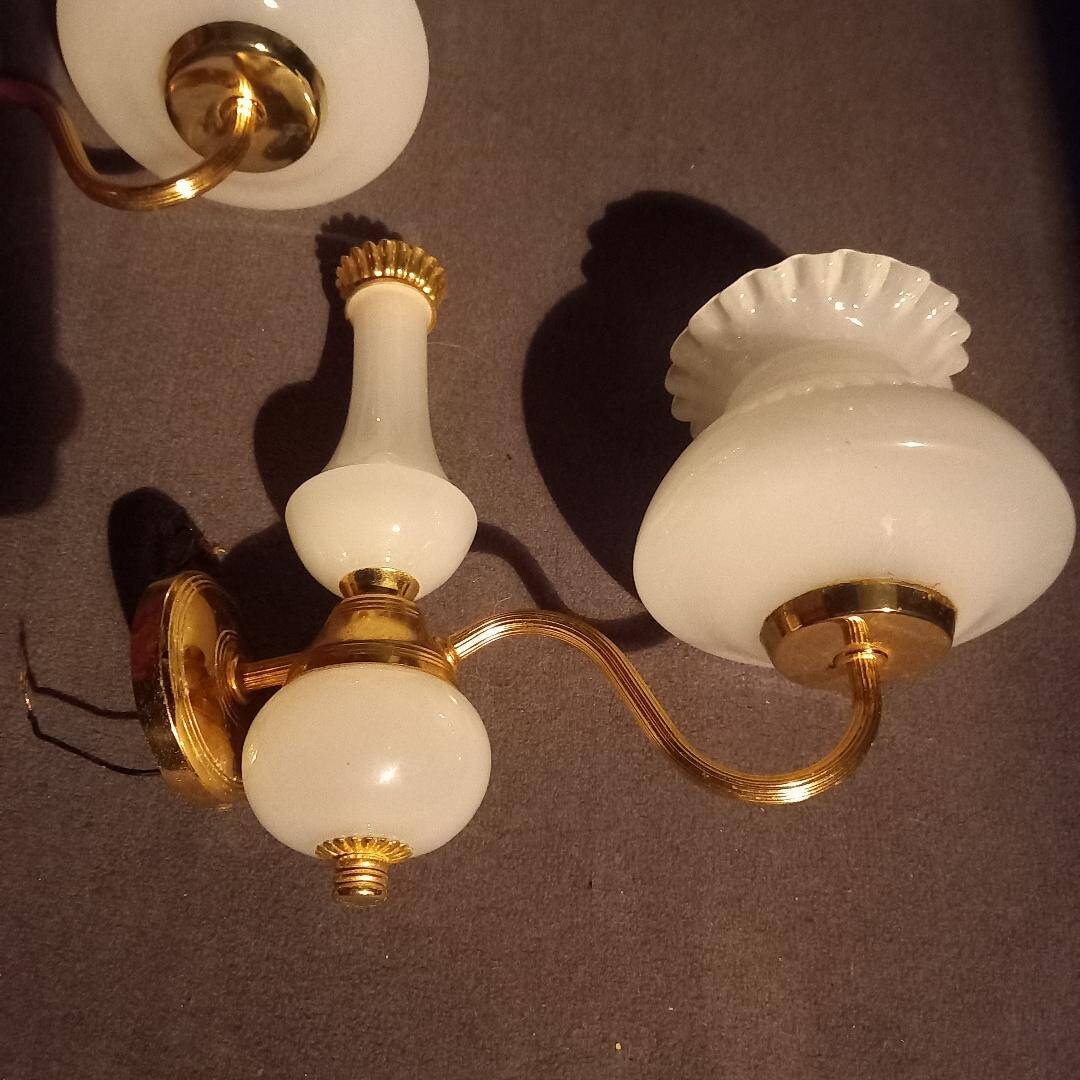 brass and white opaline wall lights