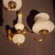 brass and white opaline wall lights