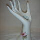 White hand ceramic soliflore with decorations