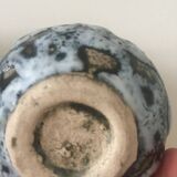 Set of two small Vallauris yellow and black milk jugs