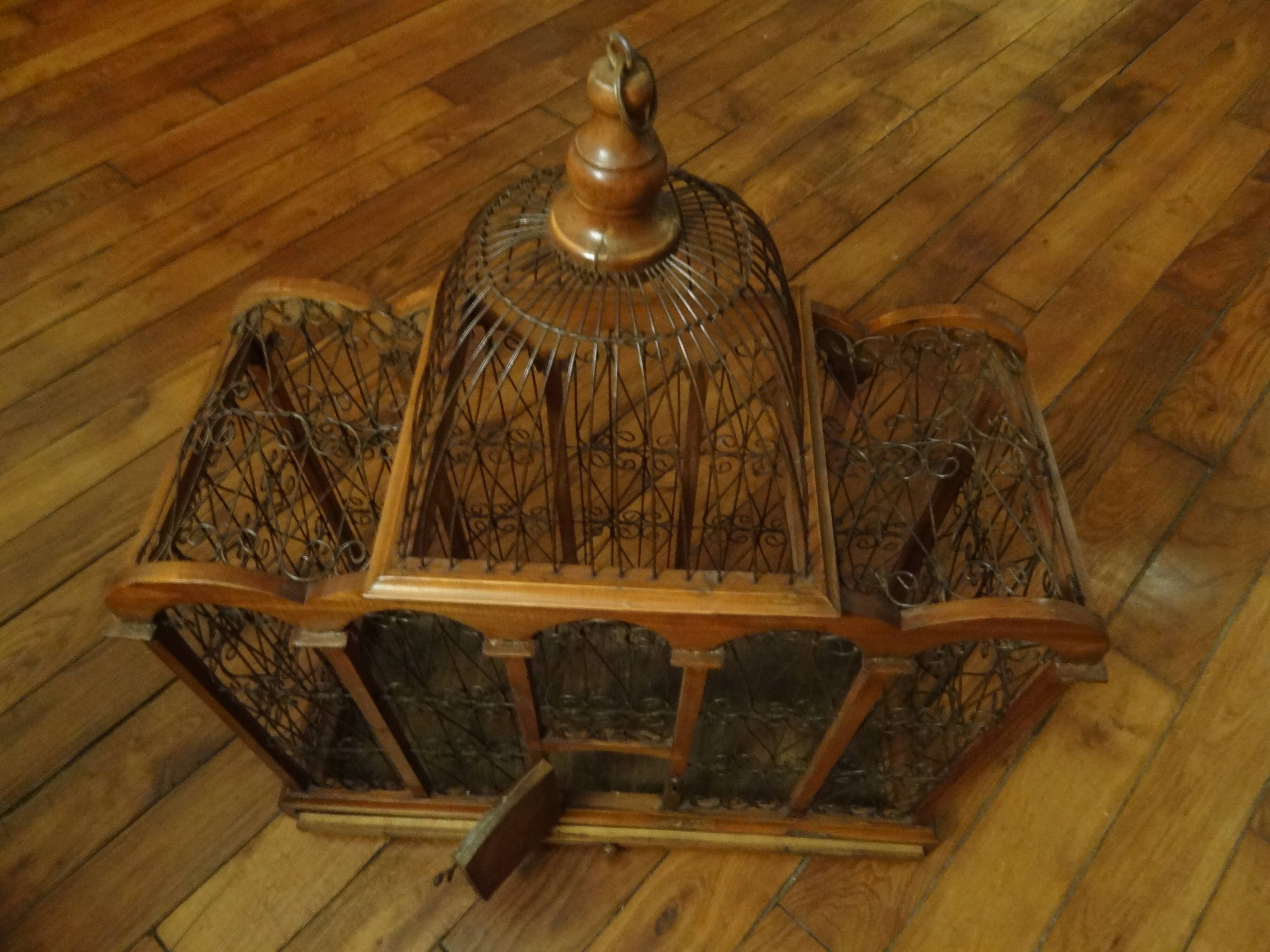Exotic wooden and metal birdcage