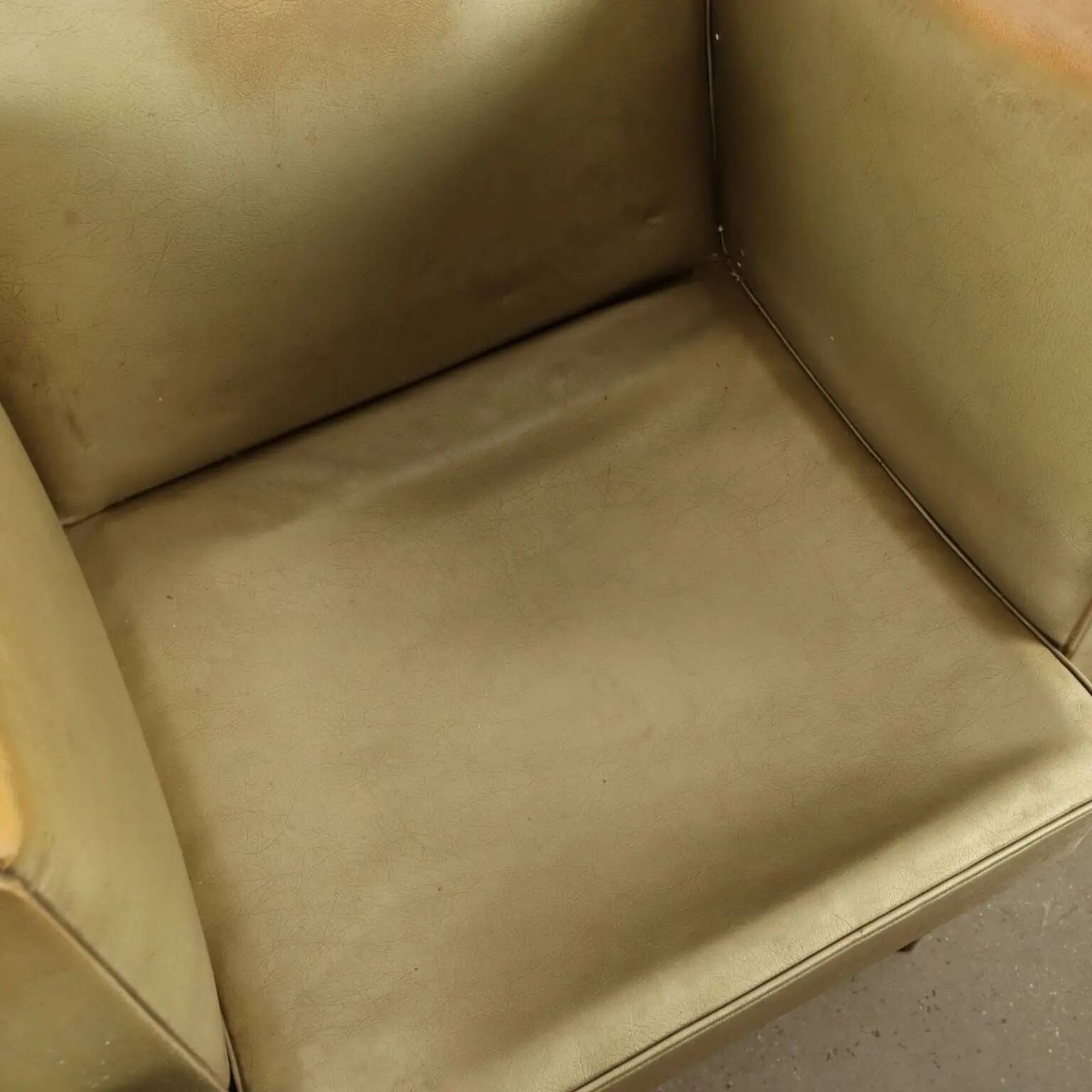 Pair of vintage armchairs from the 1950s in wood and faux leather, Argentina.