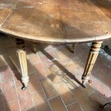 Round drop-leaf table