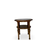 Petite table basse en noyer sculpté années 1920
