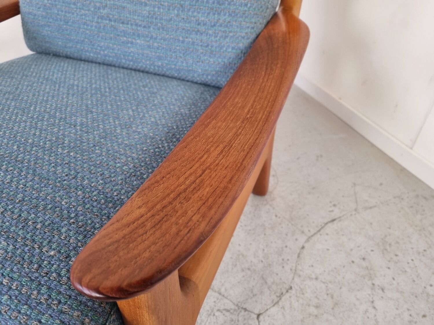 Pair of armchairs and Scandinavian teak ottoman by Juul Kristensen, Denmark 1970s