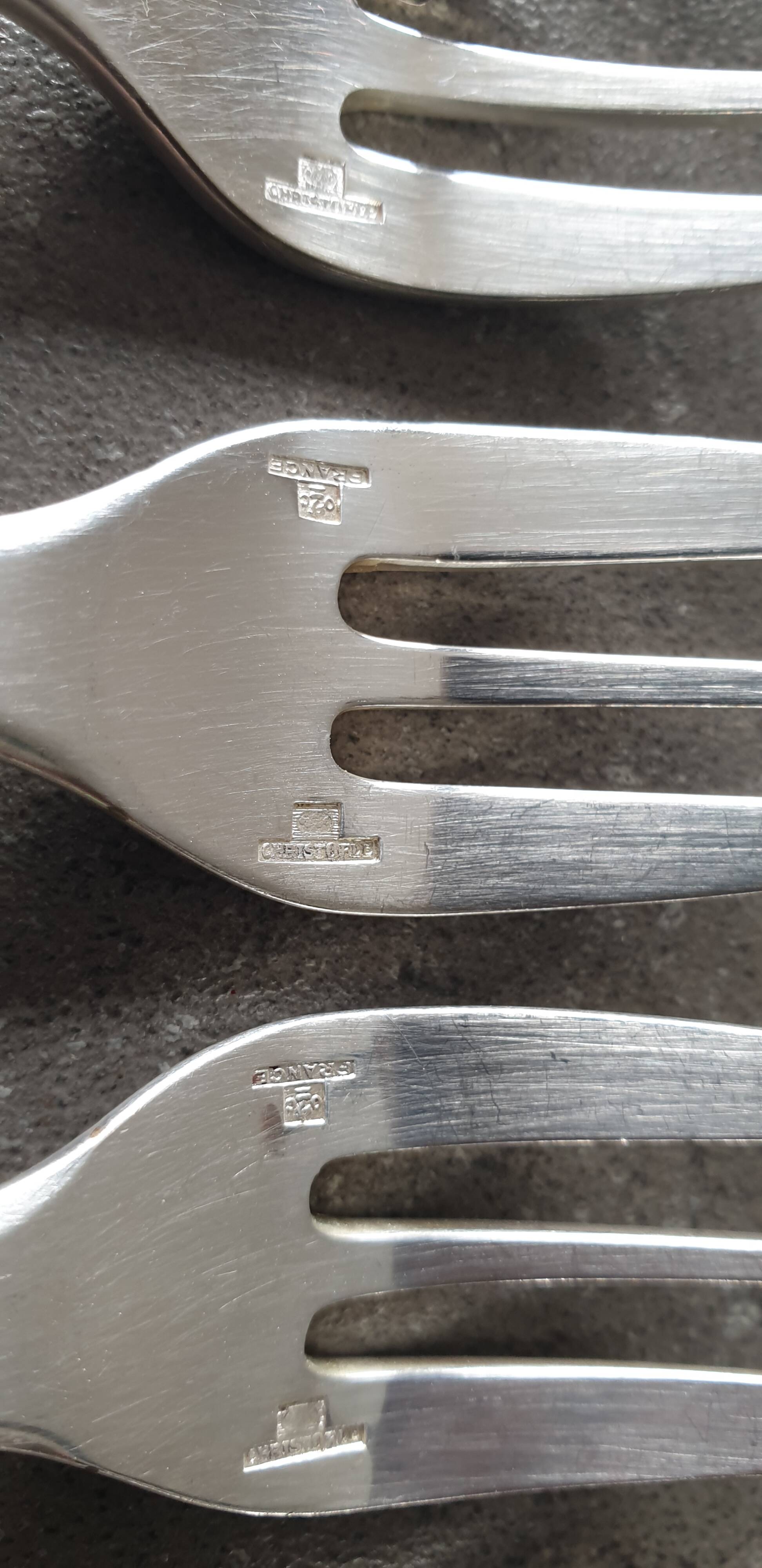 Set of 12 dessert forks and a cake server.