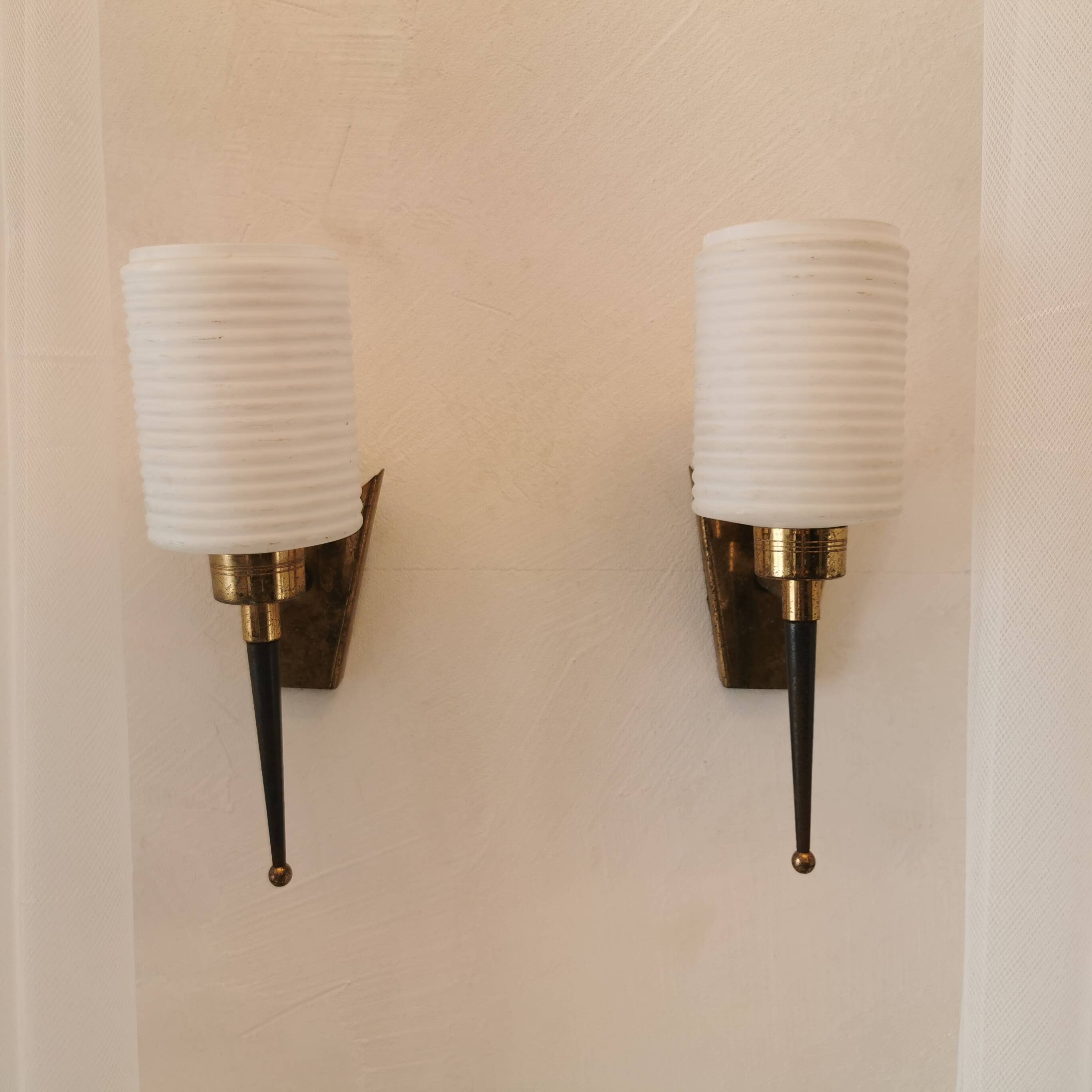Pair of brass and opaline wall lights