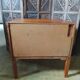 Vintage storage unit with two doors and four drawers.