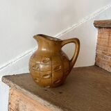 Stoneware pitcher signed Denbat