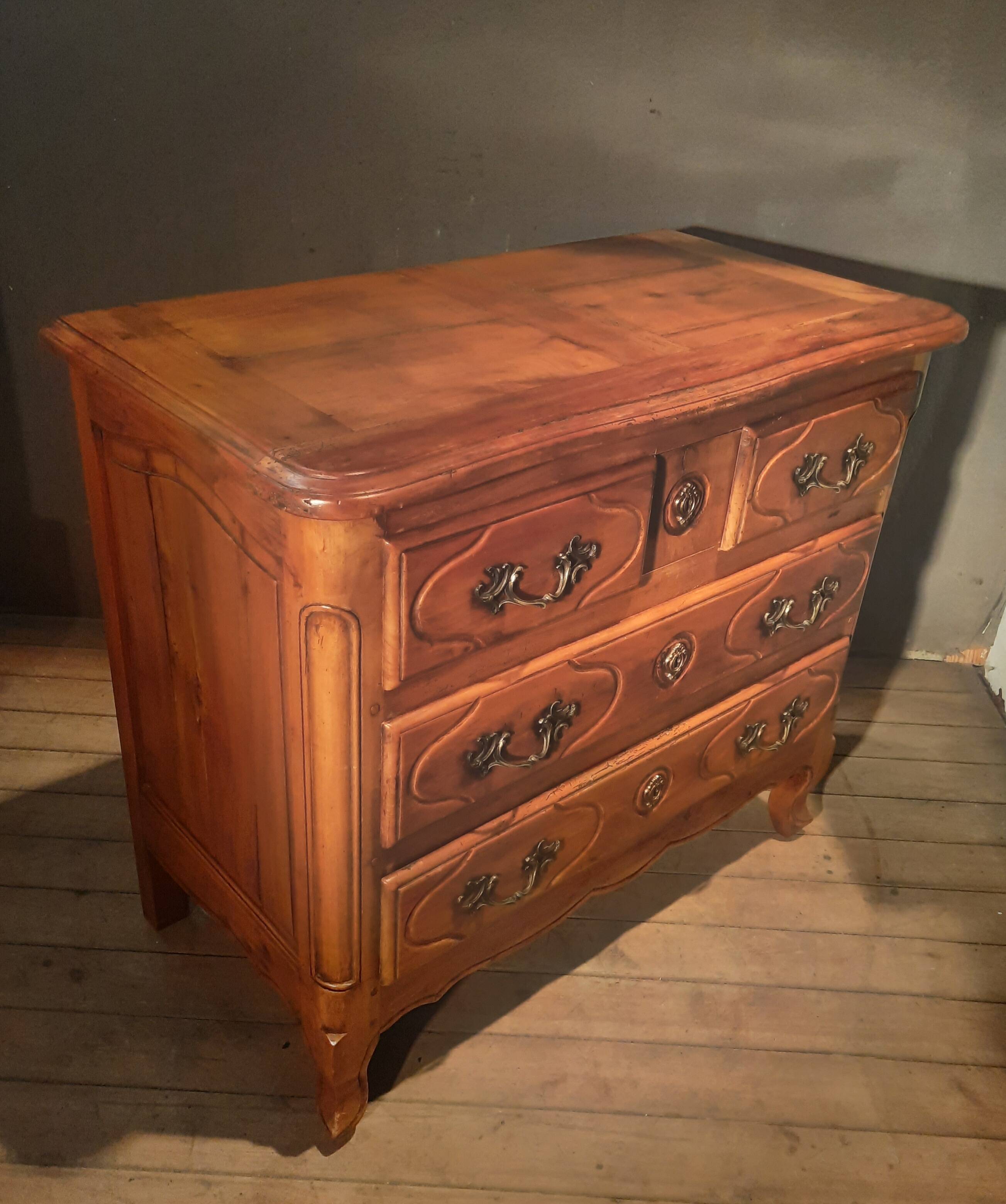 Louis XIV style commode in solid cherry wood.