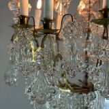 Bronze cage chandelier adorned with molded glass pendants in the shape of peacock feathers, circa 1800