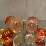 Pair of Baccarat twisted tinted crystal bottles