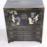 Black lacquered Chinese buffet with stone and ivory figures