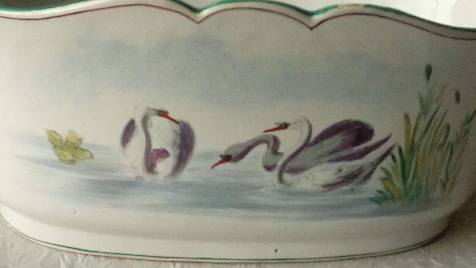 St Clement faience jardiniere with marine and swan decoration, early 20th century.