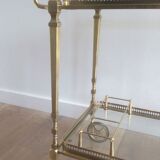 Brass rolling table from the Baguès house.