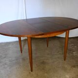 Table ronde en palissandre avec rallongedes années 70