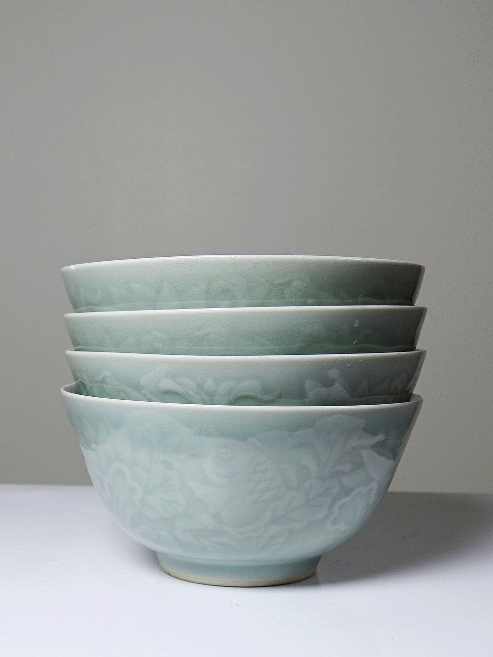 4 vintage Chinese rice bowls in celadon porcelain from the 70s-80s with reliefs of koi carp.