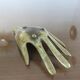 Years 70 hand-shaped ashtray brass