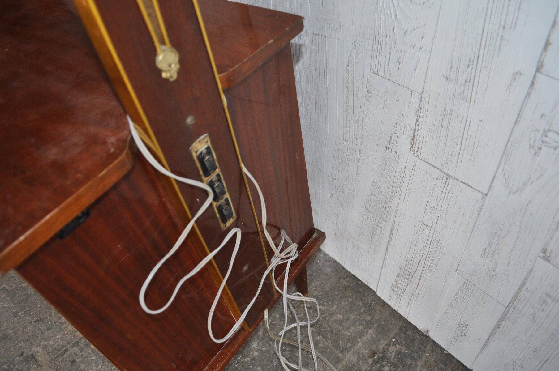 Illuminated cocktail cabinet in brown walnut and brass, multicoloured lampshades, 1950s.
