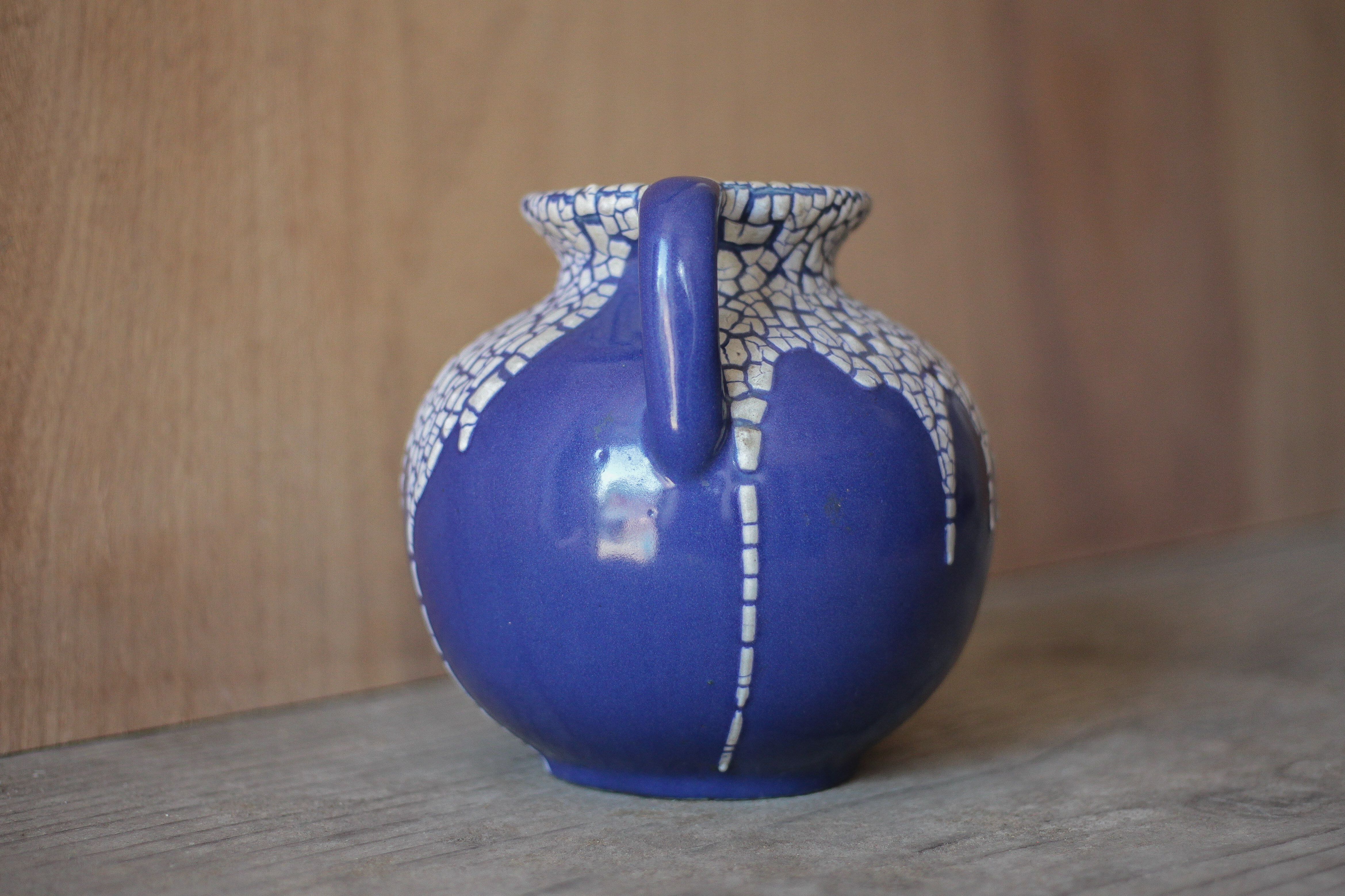 Vase signed Léon Pointu, ceramic vase with a glazed snake skin effect.